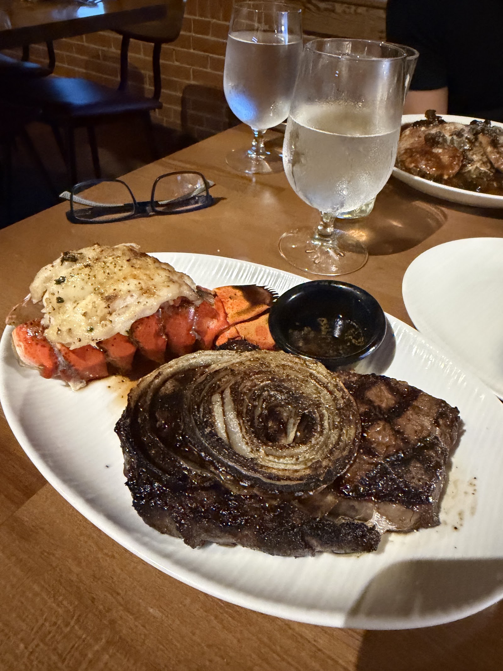 Charbroiled ribeye and lobster tail plate